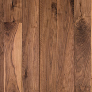 Black Walnut wide plank hardwood floor with Rubio monocoat wax oil finish. Eco friendly sustainable floor with a no VOC finish. Top-down view showing texture. High res.