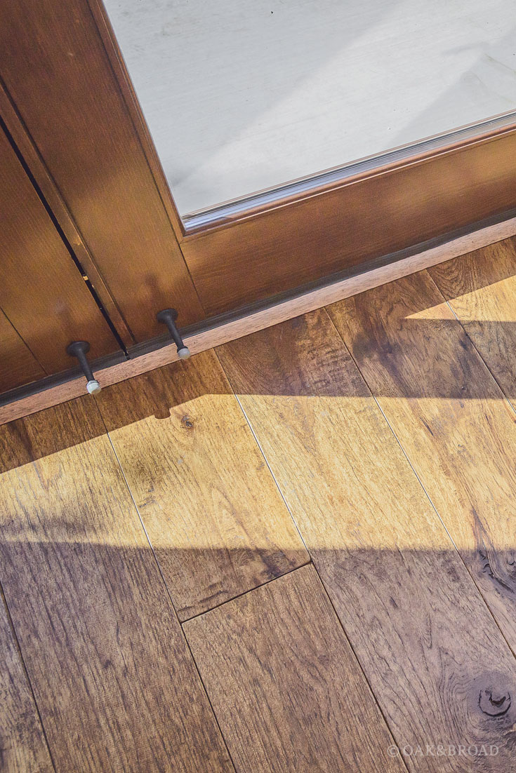 Wide Plank Hand-Scraped Hickory Hardwood Floor by Oak and Broad | detail of entryway