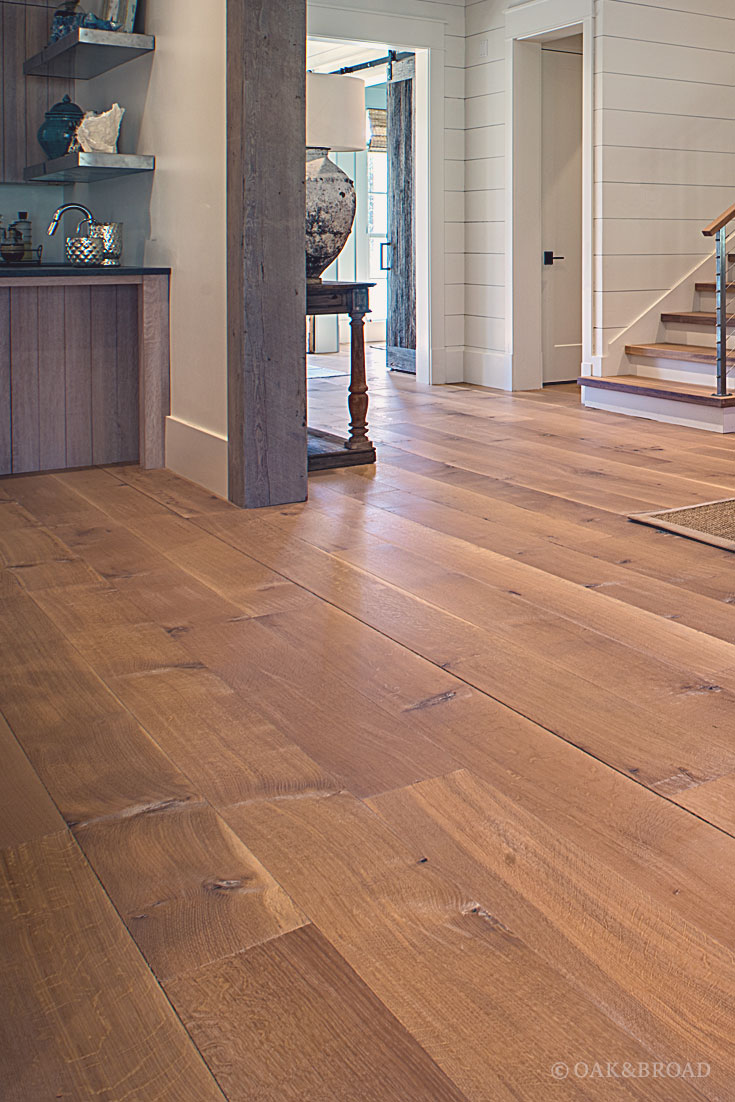 Wide Plank White Oak Hardwood Floor by Oak and Broad with Custom Stain | Rustic modern Tennessee living room with contrasting wood trim