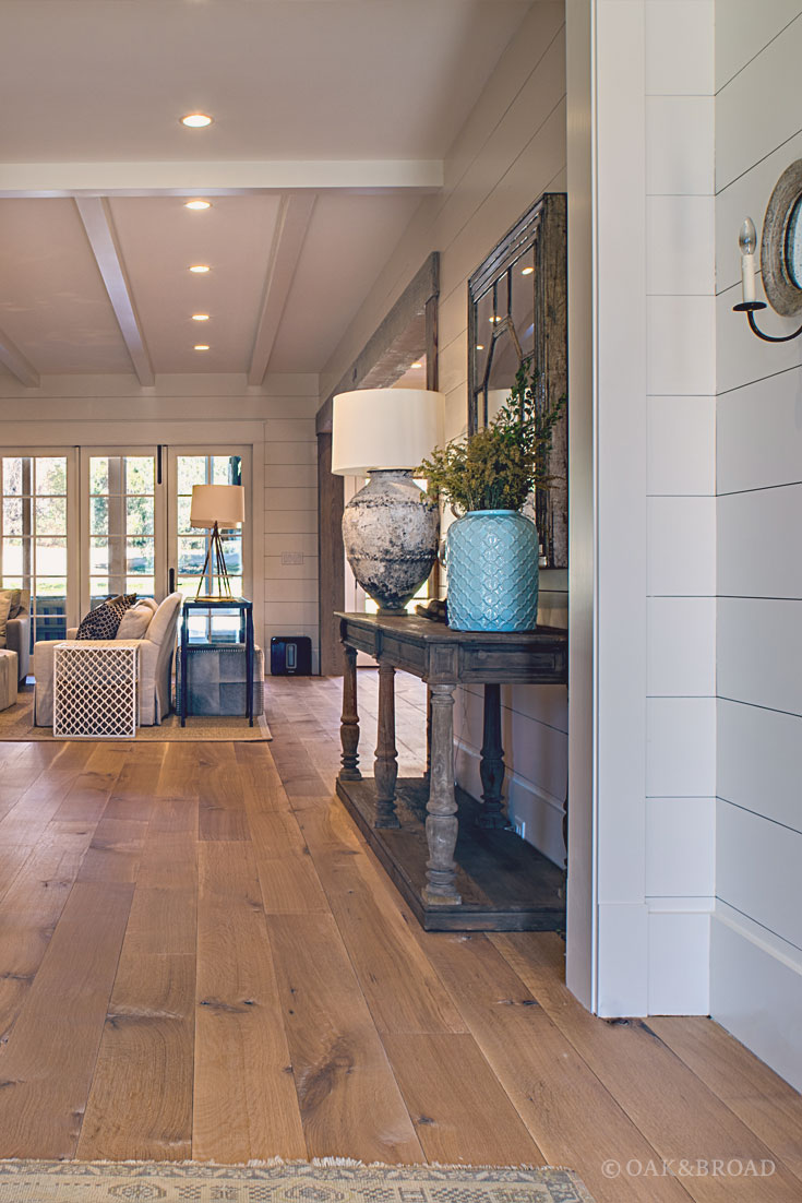 Wide Plank White Oak Hardwood Floor by Oak and Broad with Custom Stain | Teal accent in rustic modern southern home