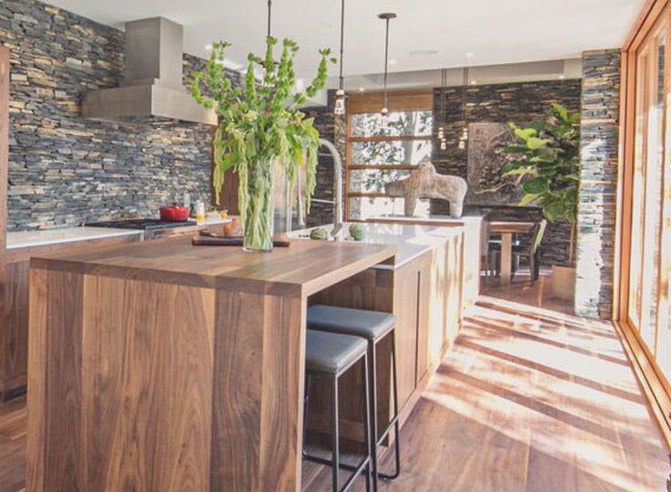 Wide Plank Black Walnut Hardwood Floor by Oak and Broad | Modern kitchen with matching black walnut island, natural light