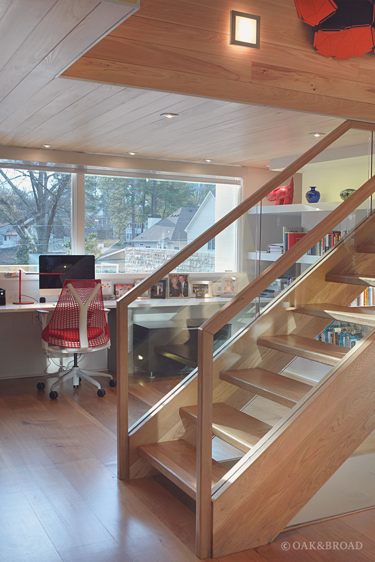 Wide Plank White Oak Hardwood Floor by Oak and Broad | Modern office area with large windows and custom wood stairs