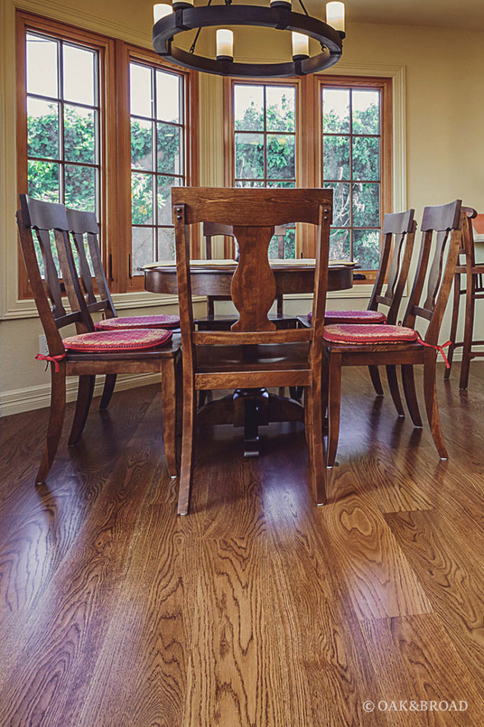 Kitchen with wide plank floor with custom stain by Oak and Broad