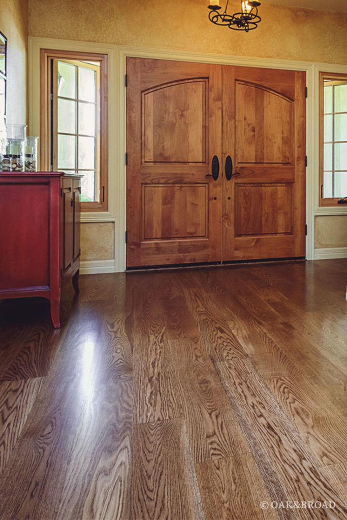 Wooden entry door and flooring customer - Oak and Broad