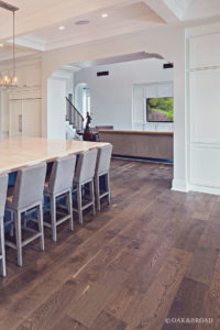 Custom wide plank hardwood floor by Oak & Broad in kitchen of Arizona Home