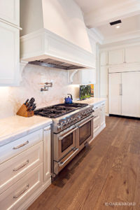 Custom wide plank hardwood floor by Oak & Broad in kitchen of Arizona Home