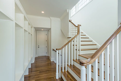 Stairway with custom treads and floor by Oak & Broad