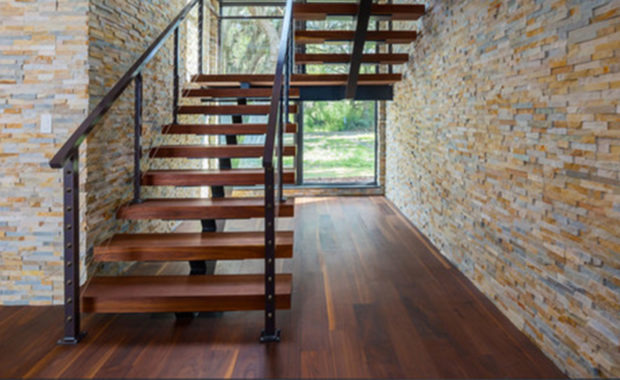 Black Walnut plank flooring in contemporary stairway